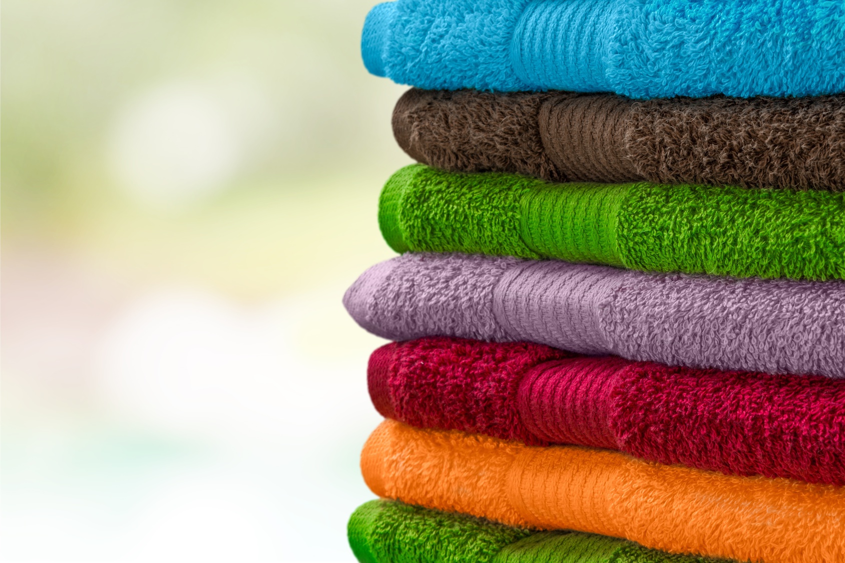 Stack of towels in different colours